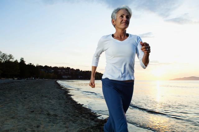 Woman running on beach